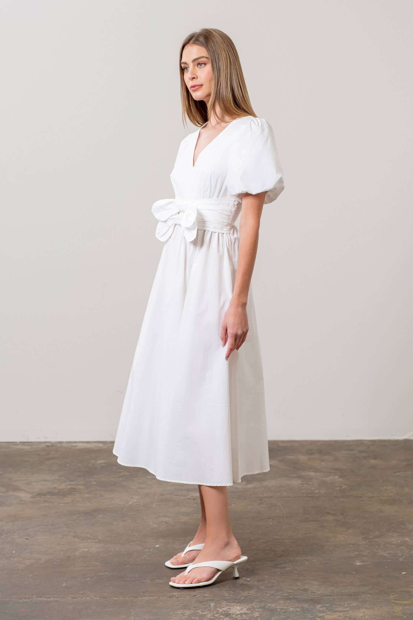 V NECK PUFF SLEEVE FRONT BOW DETAIL MIDI DRESS